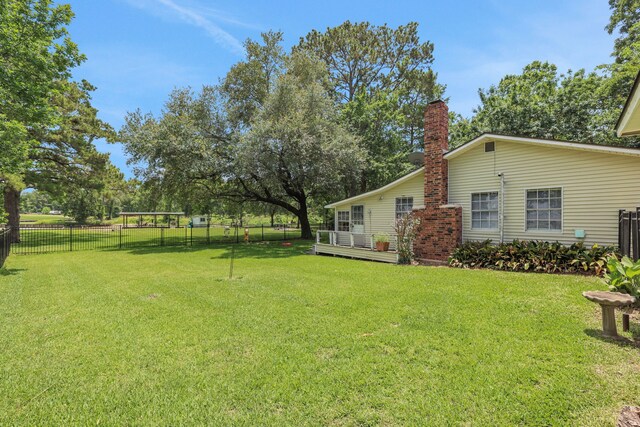 151 Lakeview Cir, Coldspring, TX 77331 - view of yard featuring a wooden deck