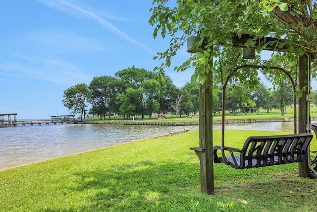 151 Lakeview Cir, Coldspring, TX 77331 - view of property's community featuring a lawn and a water view