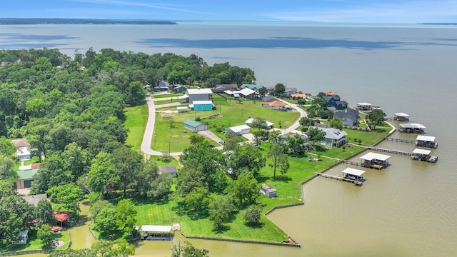 151 Lakeview Cir, Coldspring, TX 77331 - aerial view of property's location featuring a nearby body of water and nearby suburban area