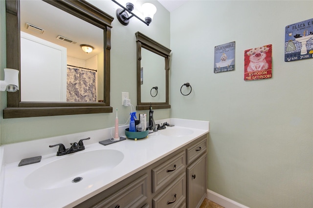 12306 Heatherwick Dr, Cypress, TX 77429 - bathroom featuring double vanity