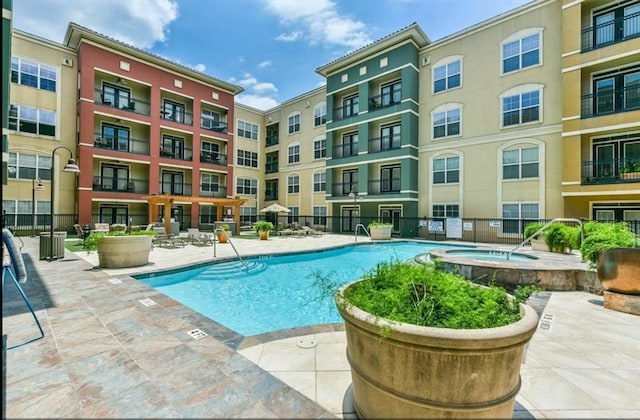 1711 Old Spanish Trl Unit 127, Houston, TX 77054 - community pool featuring a patio area