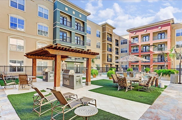 1711 Old Spanish Trl Unit 127, Houston, TX 77054 - view of patio featuring a grill