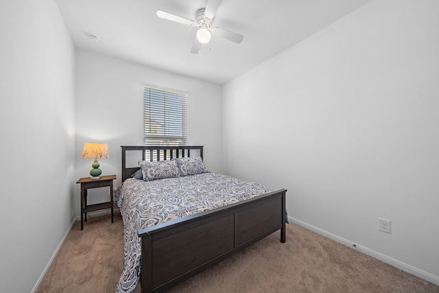 23515 Weir Box Rd, Hockley, TX 77447 - carpeted bedroom with baseboards and a ceiling fan
