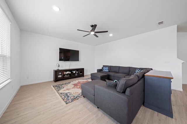 23515 Weir Box Rd, Hockley, TX 77447 - living room featuring light wood-style flooring, a ceiling fan, baseboards, and recessed lighting