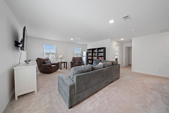 23515 Weir Box Rd, Hockley, TX 77447 - living area with light carpet, baseboards, and recessed lighting