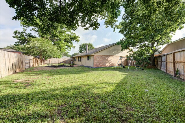 2311 Pepperweed Dr, Houston, TX 77084 - view of yard featuring a playground