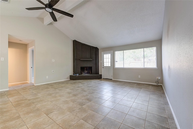 2311 Pepperweed Dr, Houston, TX 77084 - unfurnished living room with a fireplace, ceiling fan, light tile patterned flooring, and baseboards