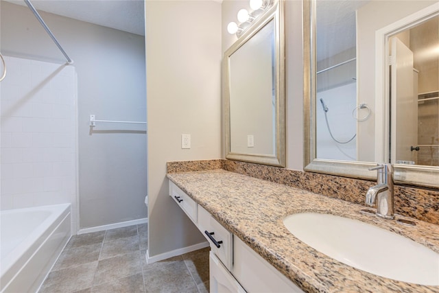 2311 Pepperweed Dr, Houston, TX 77084 - bathroom featuring vanity, baseboards, shower / bathtub combination, toilet, and tile patterned flooring