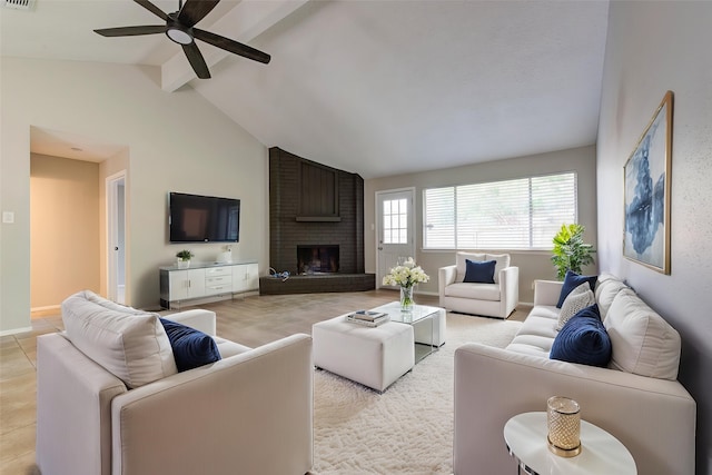 2311 Pepperweed Dr, Houston, TX 77084 - living room featuring ceiling fan, a fireplace, and baseboards