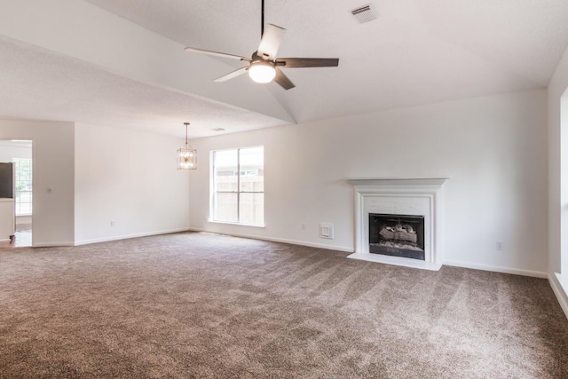 10107 Sands Trail Ct, Houston, TX 77064 - unfurnished living room with carpet flooring, a ceiling fan, baseboards, a fireplace, and lofted ceiling
