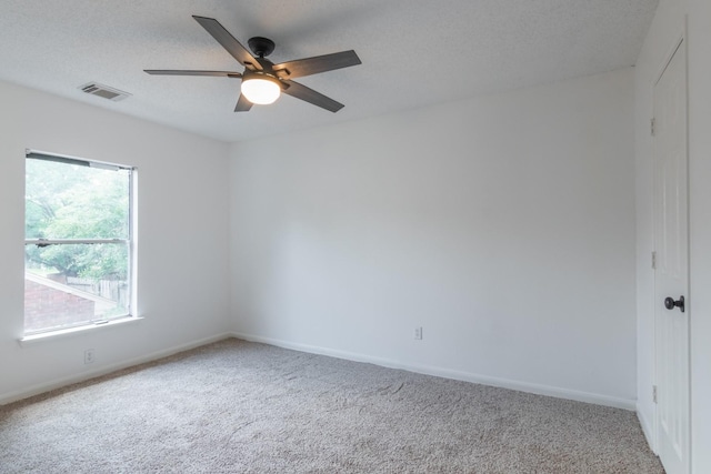 10107 Sands Trail Ct, Houston, TX 77064 - unfurnished room with carpet flooring, ceiling fan, baseboards, and a textured ceiling