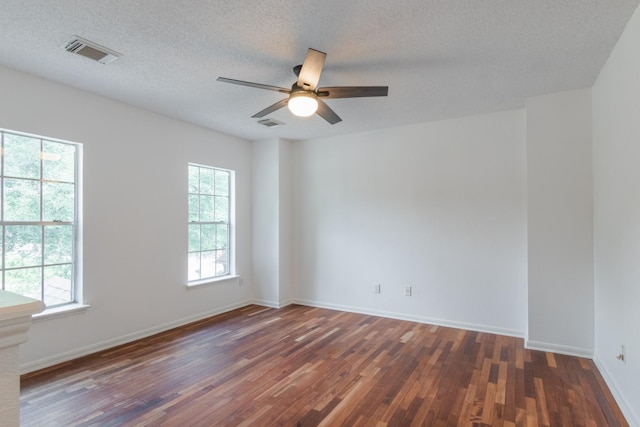 10107 Sands Trail Ct, Houston, TX 77064 - spare room featuring wood finished floors, baseboards, a ceiling fan, and a textured ceiling