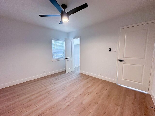 3539 Tampa St, Houston, TX 77021 - spare room featuring light wood finished floors, ceiling fan, and baseboards