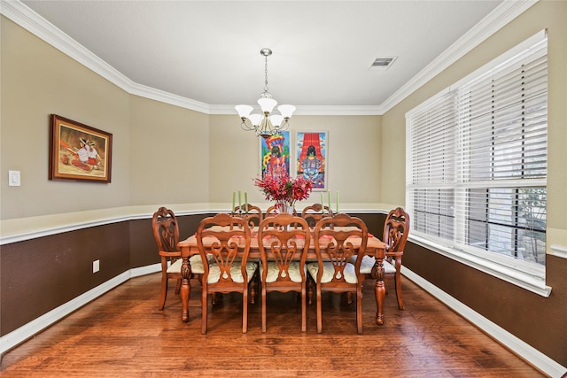 26020 Bassfield Ln, Katy, TX 77494 - dining room featuring a chandelier, wood finished floors, ornamental molding, and baseboards
