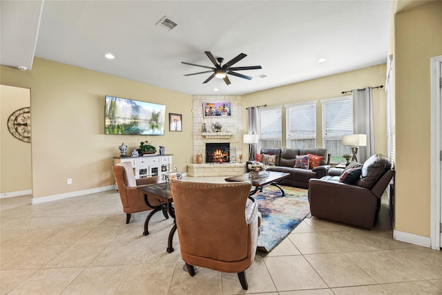 26020 Bassfield Ln, Katy, TX 77494 - living area featuring a ceiling fan, a large fireplace, light tile patterned flooring, baseboards, and recessed lighting