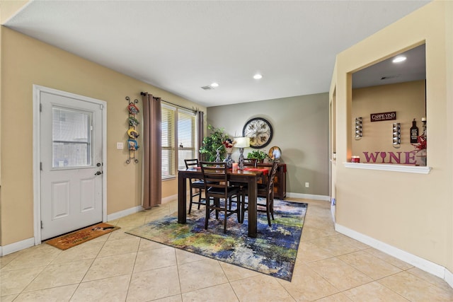 26020 Bassfield Ln, Katy, TX 77494 - dining room featuring light tile patterned floors, recessed lighting, and baseboards