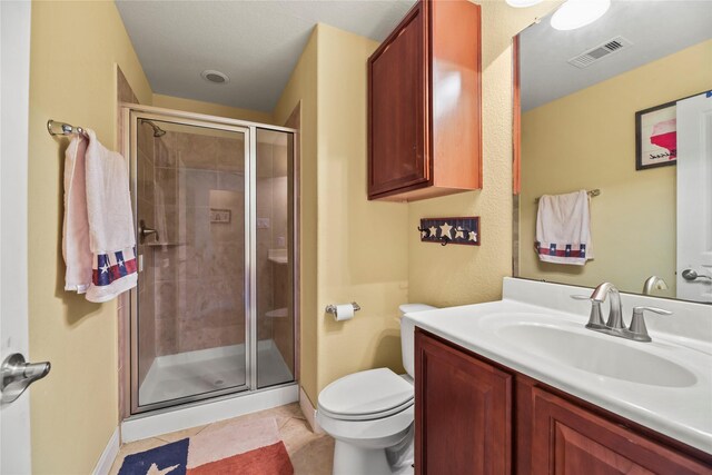 26020 Bassfield Ln, Katy, TX 77494 - full bath featuring toilet, vanity, a stall shower, and baseboards