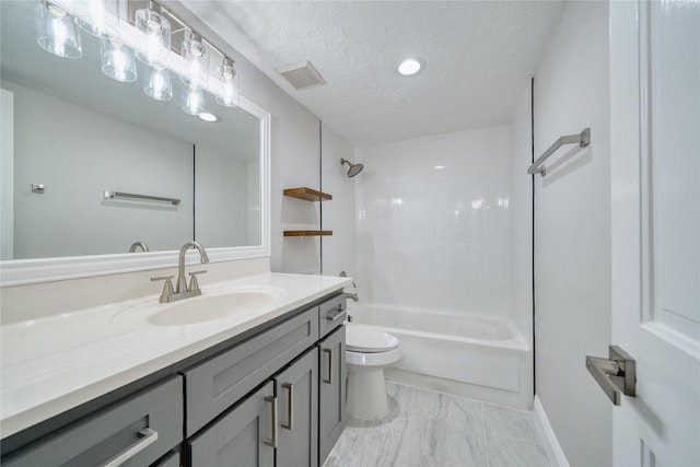 3224 Timmons Ln Unit 157, Houston, TX 77027 - full bath with toilet, vanity, marble look tile flooring,  shower combination, and a textured ceiling
