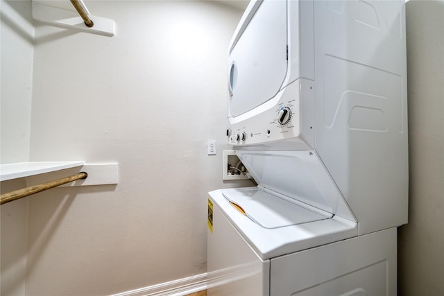 3224 Timmons Ln Unit 157, Houston, TX 77027 - washroom with stacked washer / drying machine