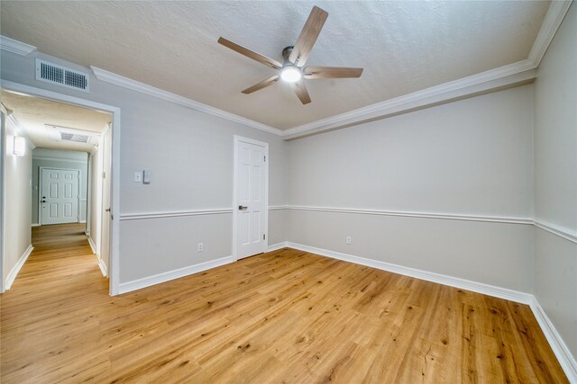 3224 Timmons Ln Unit 157, Houston, TX 77027 - unfurnished room featuring light wood-style flooring, a ceiling fan, baseboards, and ornamental molding