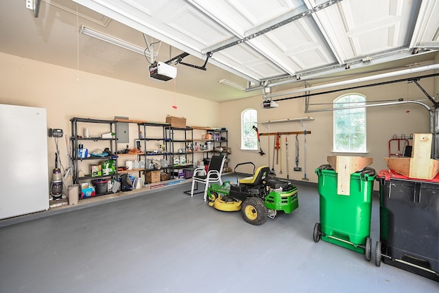 57 Cloverdale Ct, Montgomery, TX 77356 - garage featuring a garage door opener