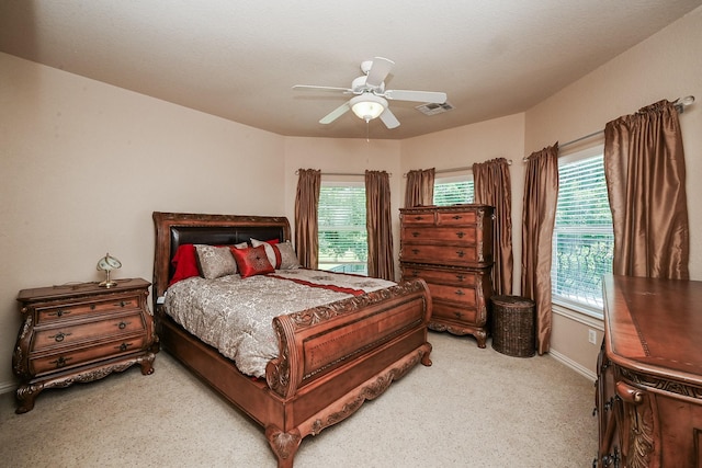 57 Cloverdale Ct, Montgomery, TX 77356 - bedroom with light colored carpet, baseboards, and ceiling fan
