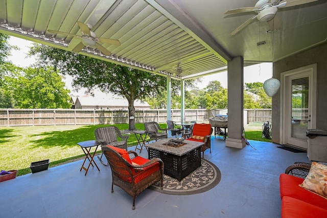 57 Cloverdale Ct, Montgomery, TX 77356 - view of patio / terrace featuring ceiling fan, a fire pit, and outdoor dining space