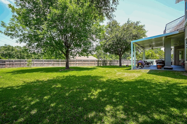 57 Cloverdale Ct, Montgomery, TX 77356 - view of yard with a ceiling fan, a patio area, and a balcony