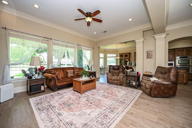 57 Cloverdale Ct, Montgomery, TX 77356 - living room featuring decorative columns, ceiling fan, light wood-type flooring, recessed lighting, and ornamental molding