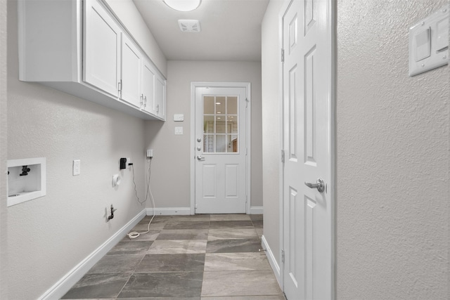 1139 Lehman St, Houston, TX 77018 - laundry room featuring cabinet space, baseboards, hookup for a washing machine, and hookup for a gas dryer