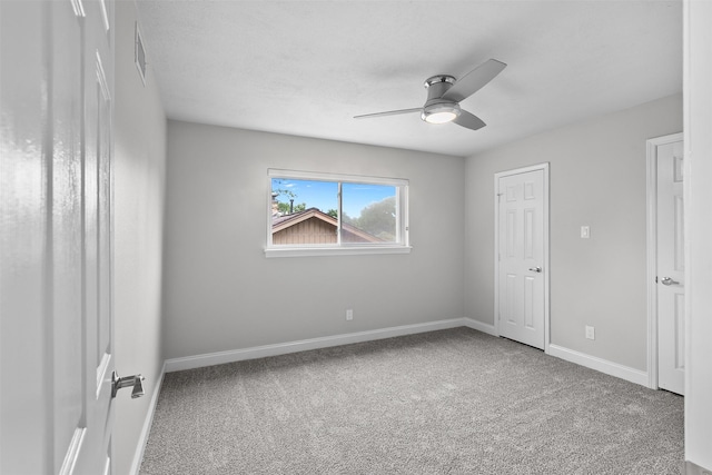 1139 Lehman St, Houston, TX 77018 - unfurnished bedroom with carpet floors, baseboards, and a ceiling fan