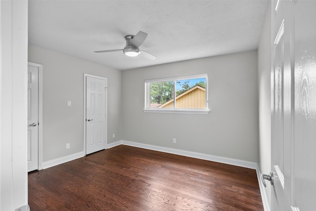 1139 Lehman St, Houston, TX 77018 - unfurnished bedroom featuring dark wood-style flooring, baseboards, and ceiling fan