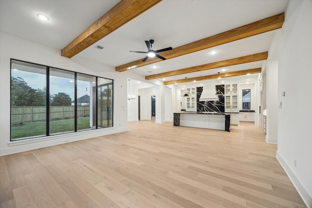1112 Kinley Ln, Houston, TX 77018 - unfurnished living room featuring light wood-type flooring, ceiling fan, recessed lighting, and beam ceiling