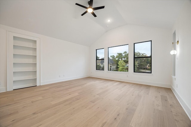 1112 Kinley Ln, Houston, TX 77018 - unfurnished bedroom with light wood-type flooring, vaulted ceiling, and ceiling fan