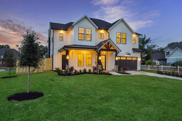 1112 Kinley Ln, Houston, TX 77018 - modern inspired farmhouse with a standing seam roof, an attached garage, board and batten siding, concrete driveway, and a metal roof