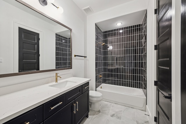 1112 Kinley Ln, Houston, TX 77018 - bathroom featuring vanity, shower / bath combination, and marble finish floors
