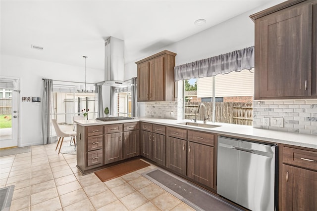 1706 Brightlake Way, Missouri City, TX 77459 - kitchen with stainless steel appliances, island range hood, a sink, light countertops, and decorative backsplash
