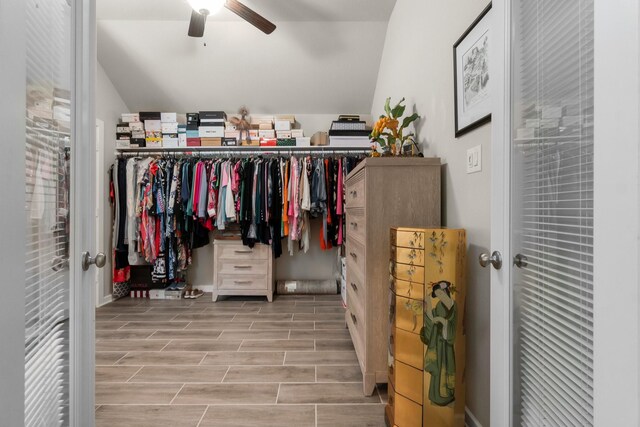 371 Westlake Terrace Dr, Conroe, TX 77304 - walk in closet featuring wood finished floors, a ceiling fan, and lofted ceiling