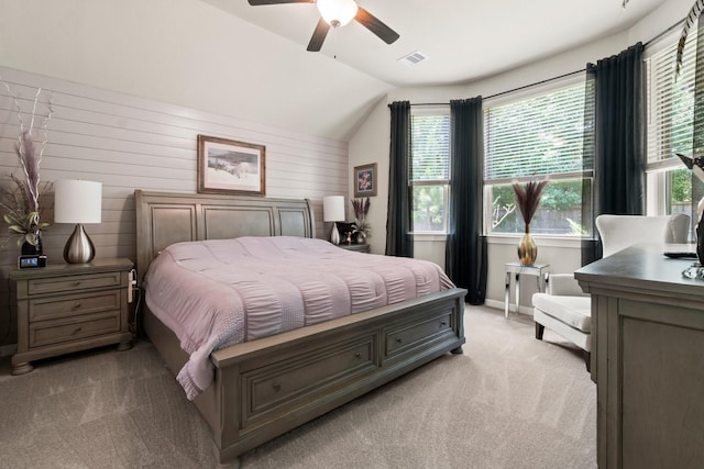 371 Westlake Terrace Dr, Conroe, TX 77304 - bedroom with light colored carpet, vaulted ceiling, multiple windows, and ceiling fan