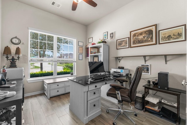 371 Westlake Terrace Dr, Conroe, TX 77304 - home office featuring a ceiling fan, wood tiled floors, and baseboards