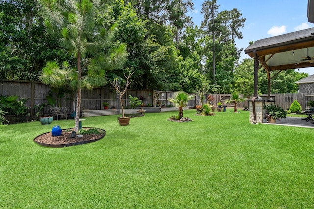 371 Westlake Terrace Dr, Conroe, TX 77304 - view of yard featuring ceiling fan