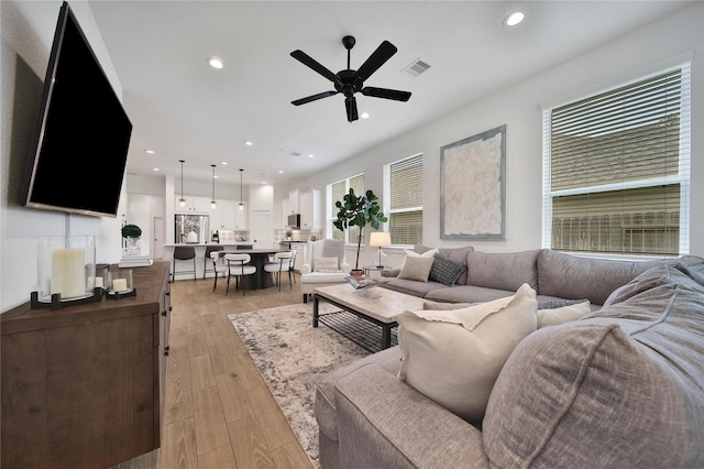 296 N Cascade Heights Dr, Montgomery, TX 77316 - living area featuring light wood-type flooring, ceiling fan, and recessed lighting
