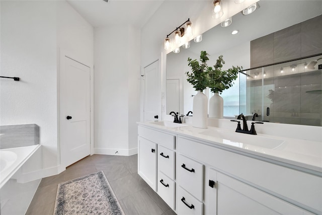 296 N Cascade Heights Dr, Montgomery, TX 77316 - full bathroom with a bath, double vanity, a shower stall, tile patterned flooring, and baseboards