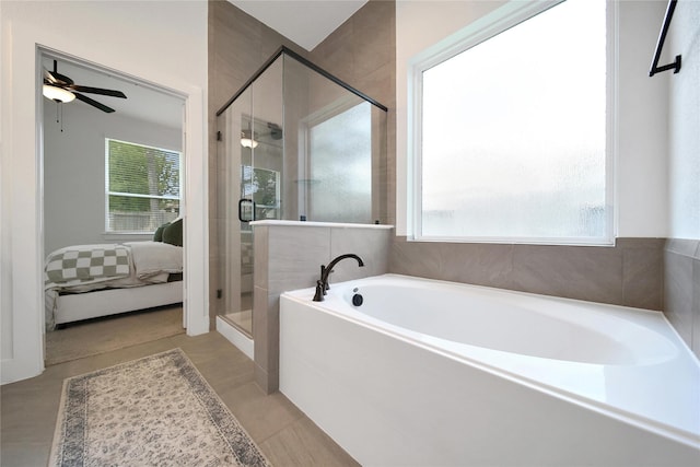 296 N Cascade Heights Dr, Montgomery, TX 77316 - ensuite bathroom featuring a garden tub, a stall shower, and ceiling fan