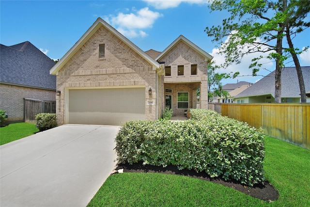 296 N Cascade Heights Dr, Montgomery, TX 77316 - view of front facade with brick siding, a garage, and concrete driveway