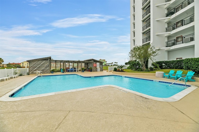 7310 Seawall Blvd Unit 210, Galveston, TX 77551 - community pool with a patio area