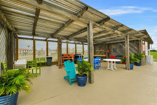 7310 Seawall Blvd Unit 210, Galveston, TX 77551 - view of patio / terrace with a pergola