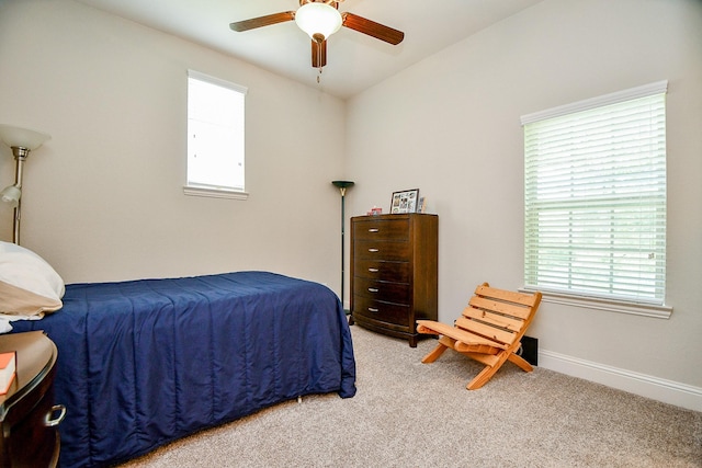 1704 Graystone Hills Dr, Conroe, TX 77304 - bedroom with light carpet, a ceiling fan, and baseboards