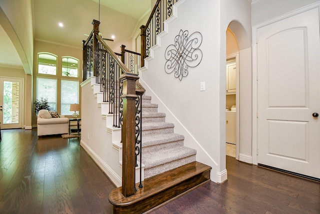 1704 Graystone Hills Dr, Conroe, TX 77304 - stairway featuring arched walkways, hardwood / wood-style floors, ornamental molding, baseboards, and recessed lighting