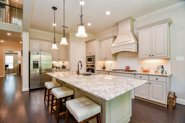 1704 Graystone Hills Dr, Conroe, TX 77304 - kitchen featuring appliances with stainless steel finishes, custom exhaust hood, a sink, crown molding, and dark wood finished floors